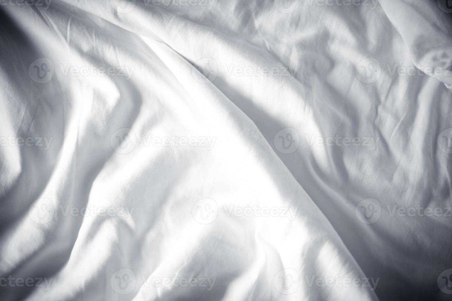 white bed linen gradient texture blurred curve style of abstract luxury fabric,Wrinkled bed linen and dark gray shadows,background photo