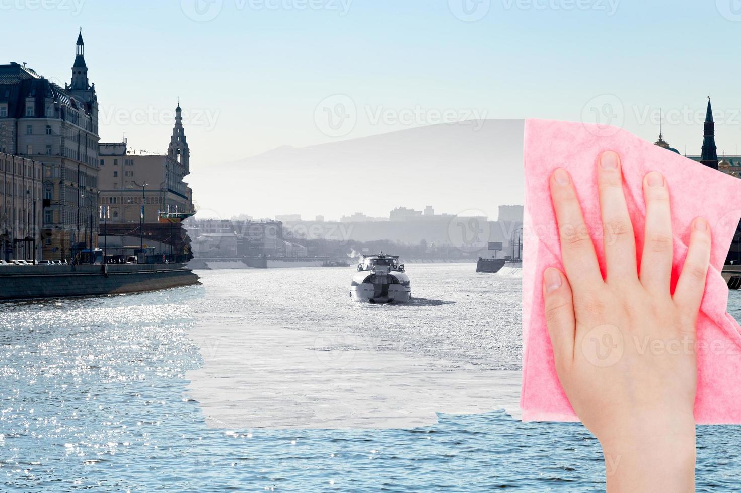 hand deletes winter Moscow River by pink cloth photo