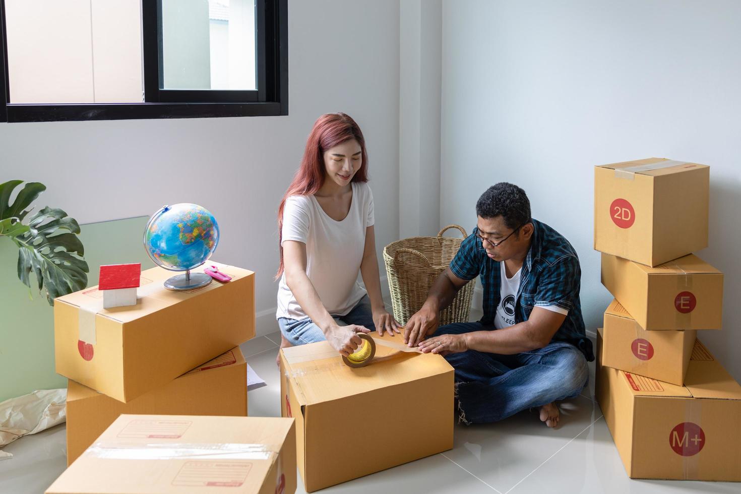 Young couple in new apartment,  New home or property buying concept photo