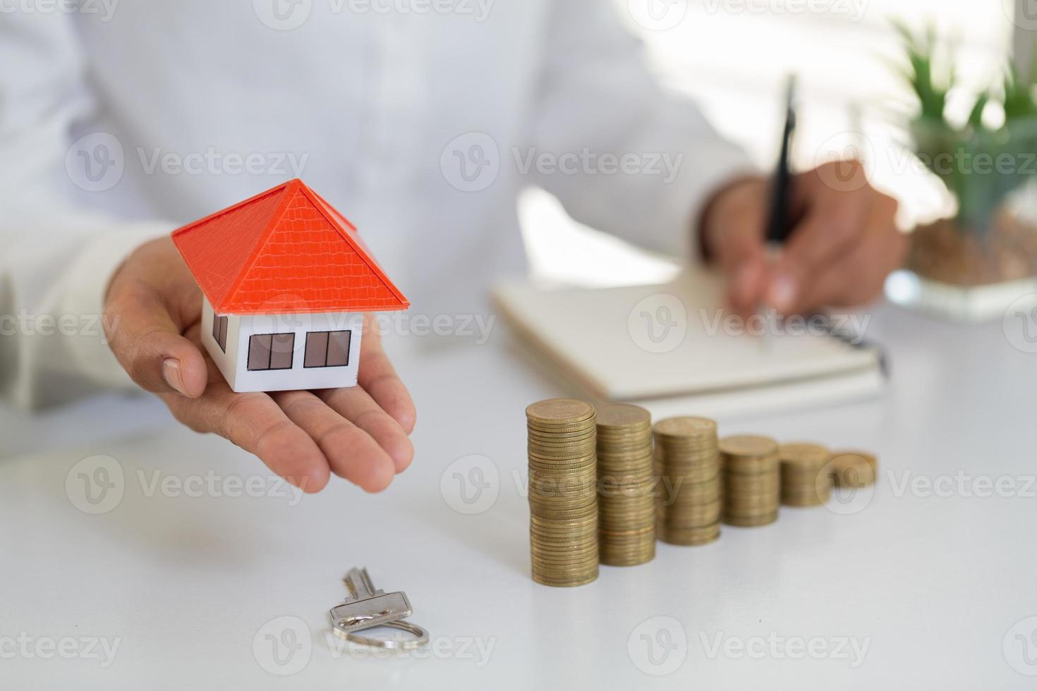 planning savings money of coins to buy a home, concept for property ladder, mortgage and real estate investment. for saving or investment for a house, growing business photo