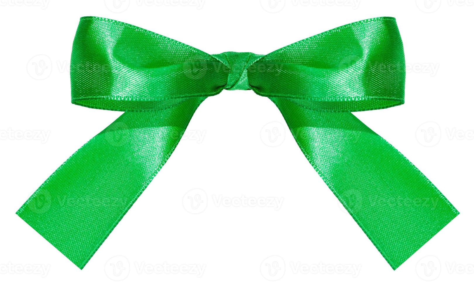 green satin bow knot isolated on white photo