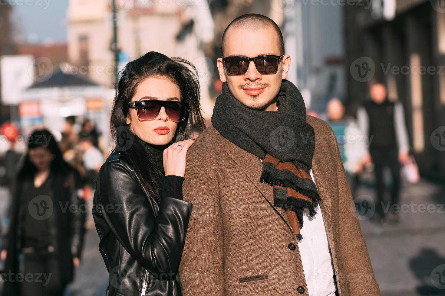 Couple walking and posing on the street photo