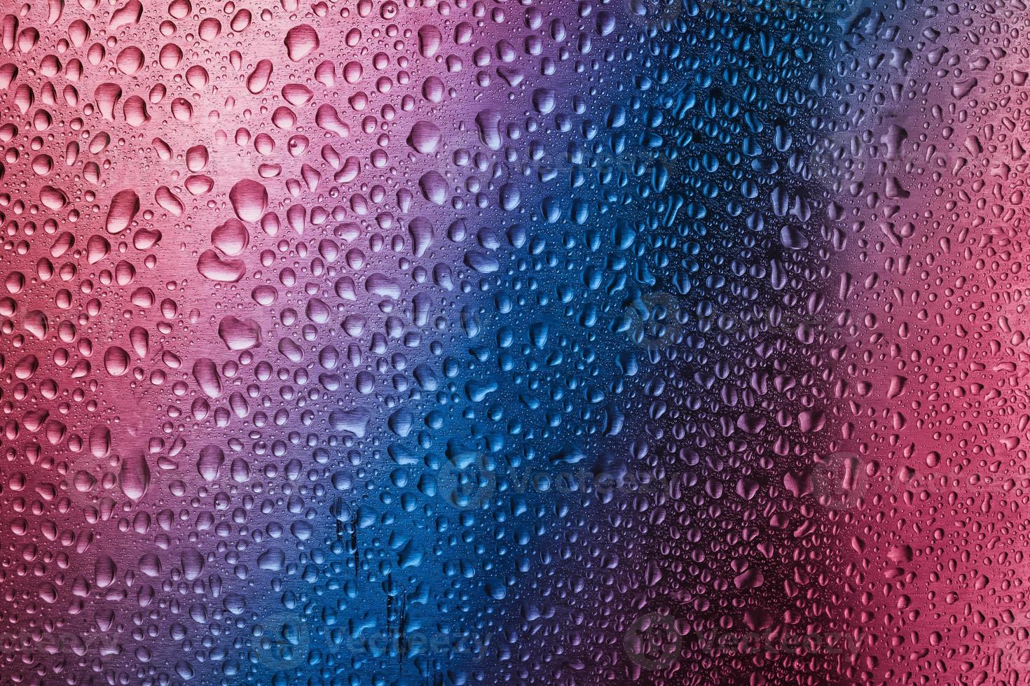 Abstract droplets on metal surface. photo