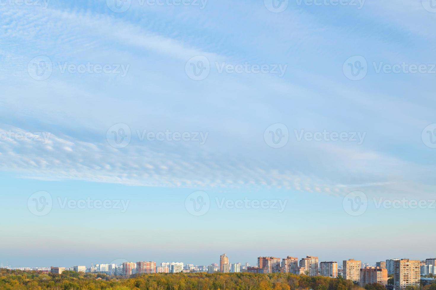 blue sunset sky over residential district photo