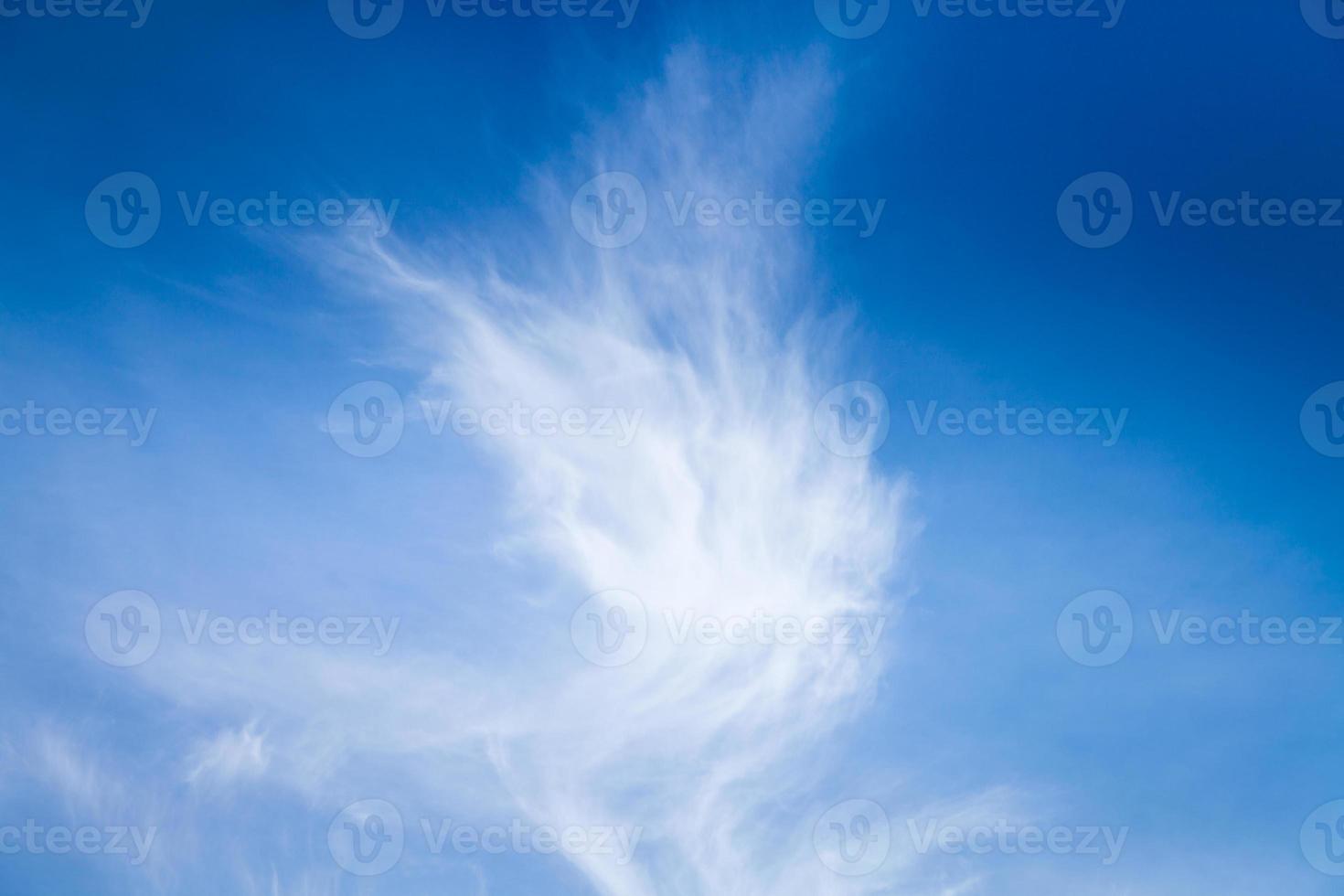 cirrus clouds in blue sky photo