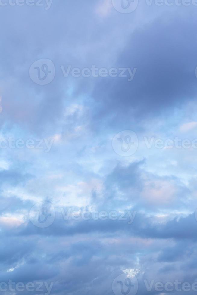 blue clouds in twiling sky in winter photo