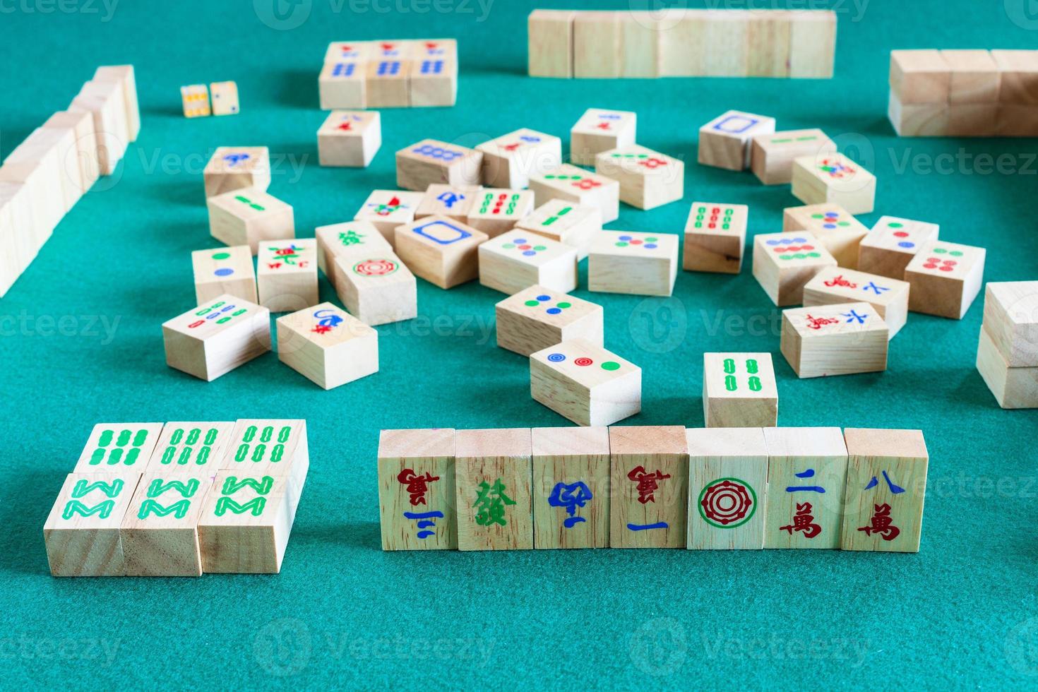 side view of gameboard of mahjong game photo