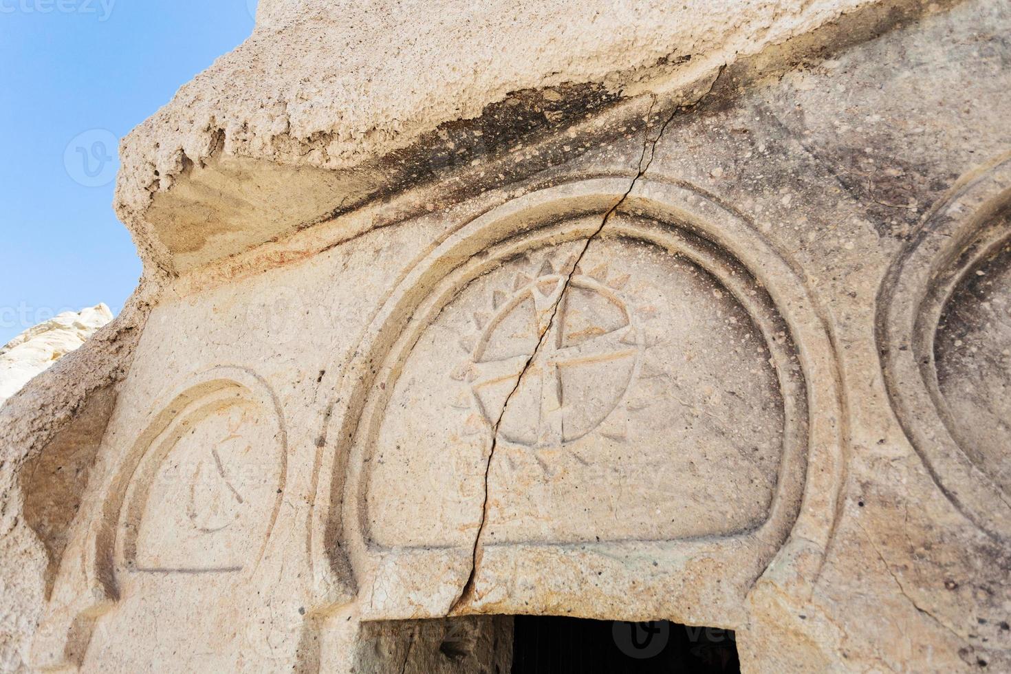 outdoor decor of ancient cave church near Goreme photo