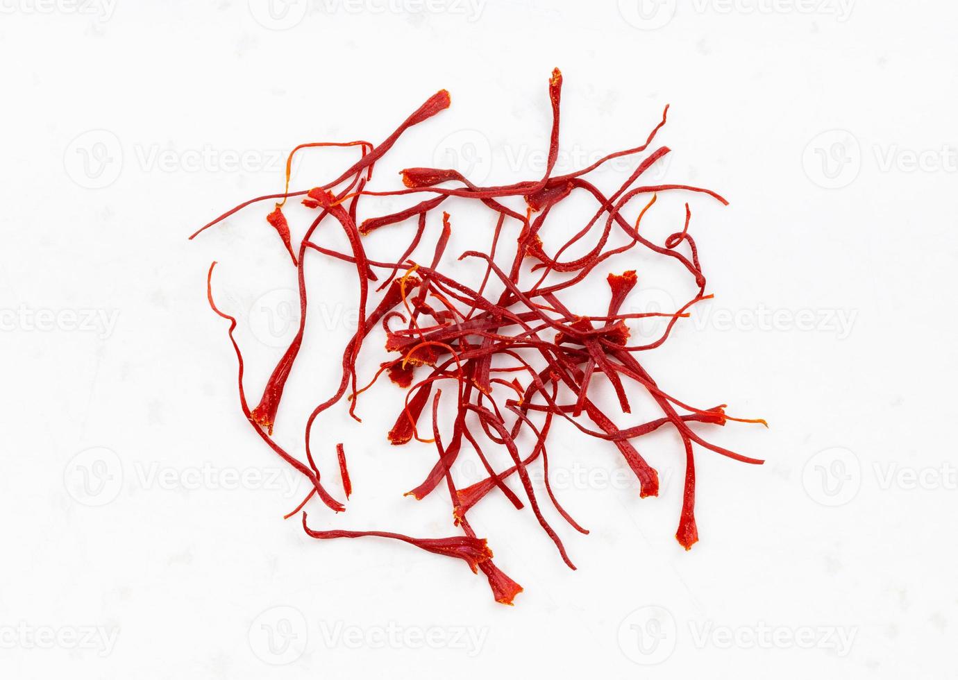 several crocus saffron threads close up on gray photo
