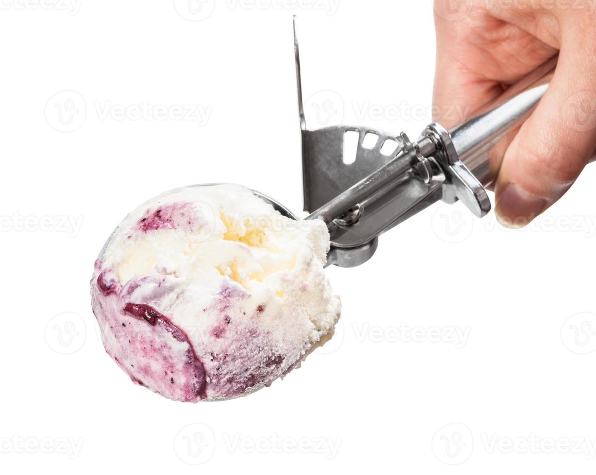 Disher Scoop with Blueberry Ice Cream Over Bowl Stock Image