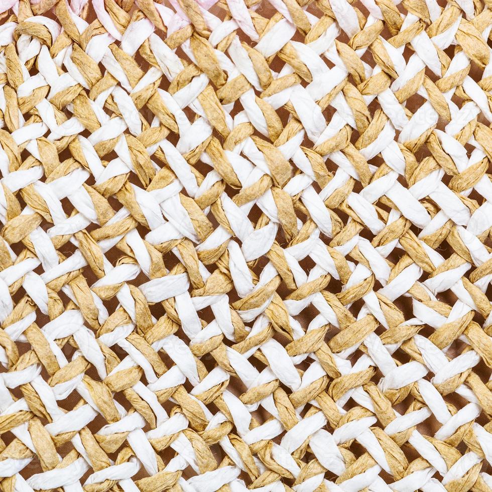 texture of straw hat from interwoven toyo fibers photo