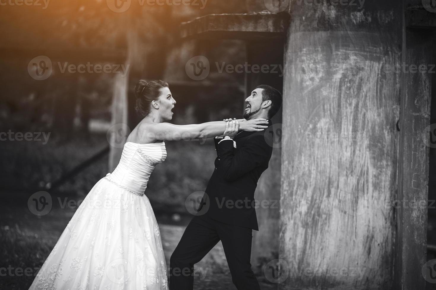 bride and groom having fun photo