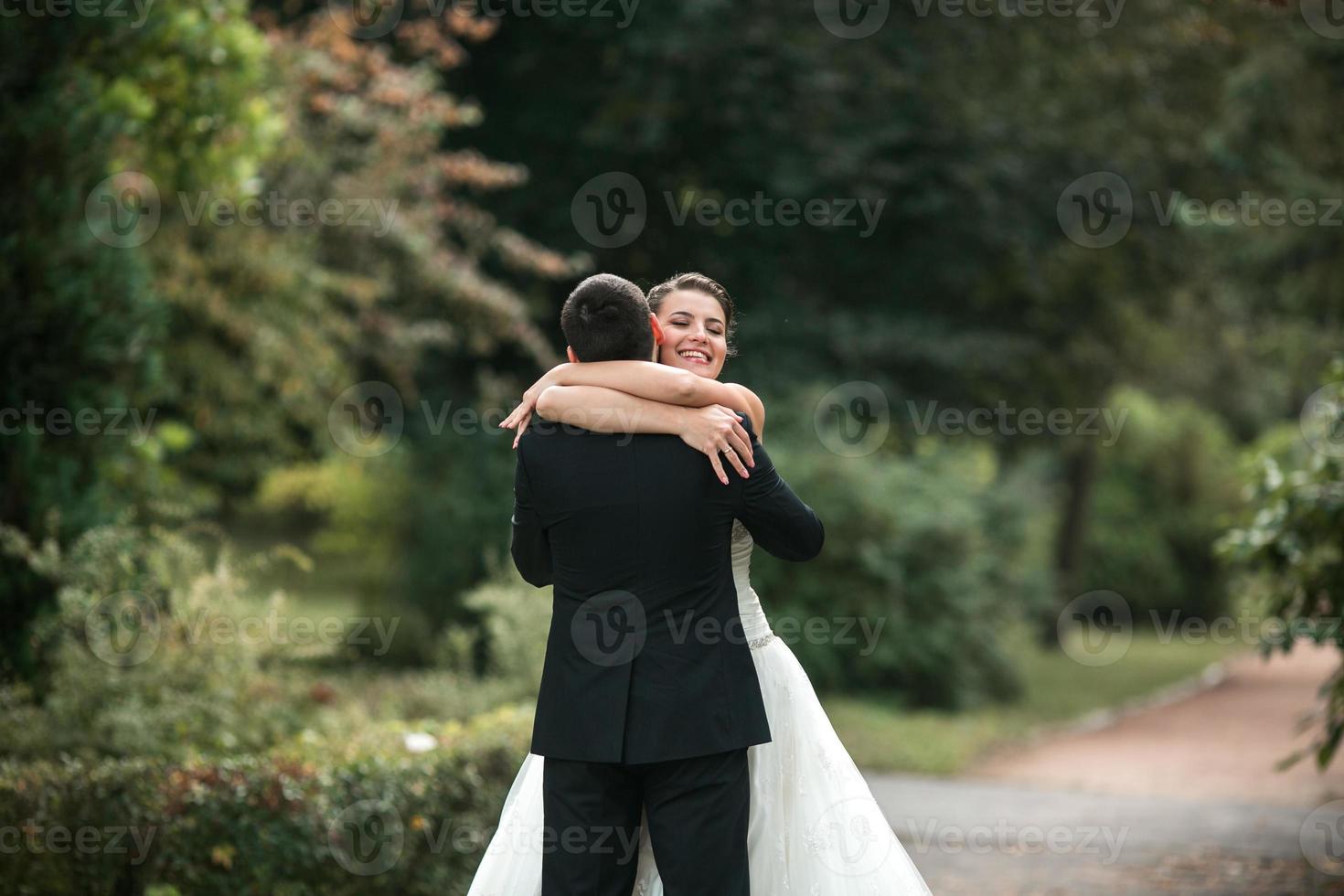 Beautiful wedding couple posing photo