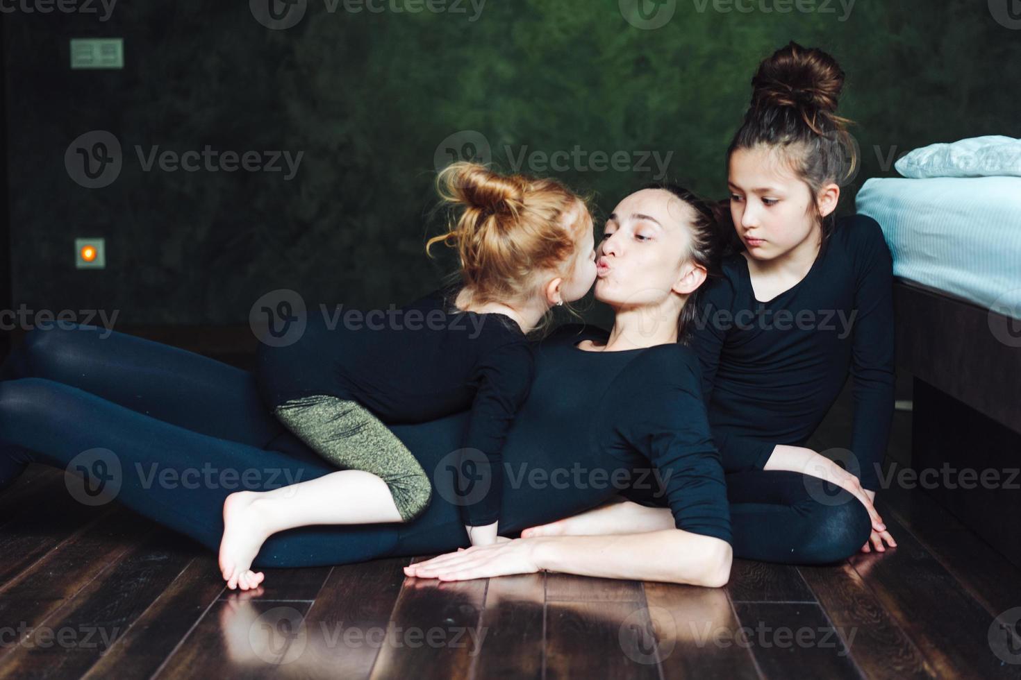 Mom and two daughters spend time together photo