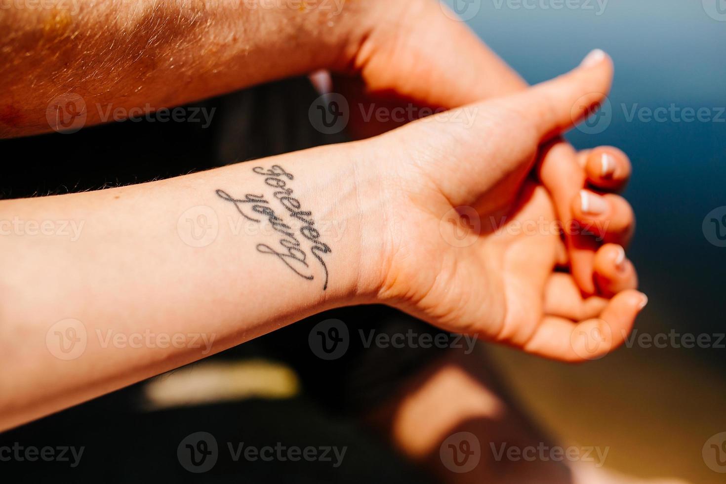 arm with tattoo photo