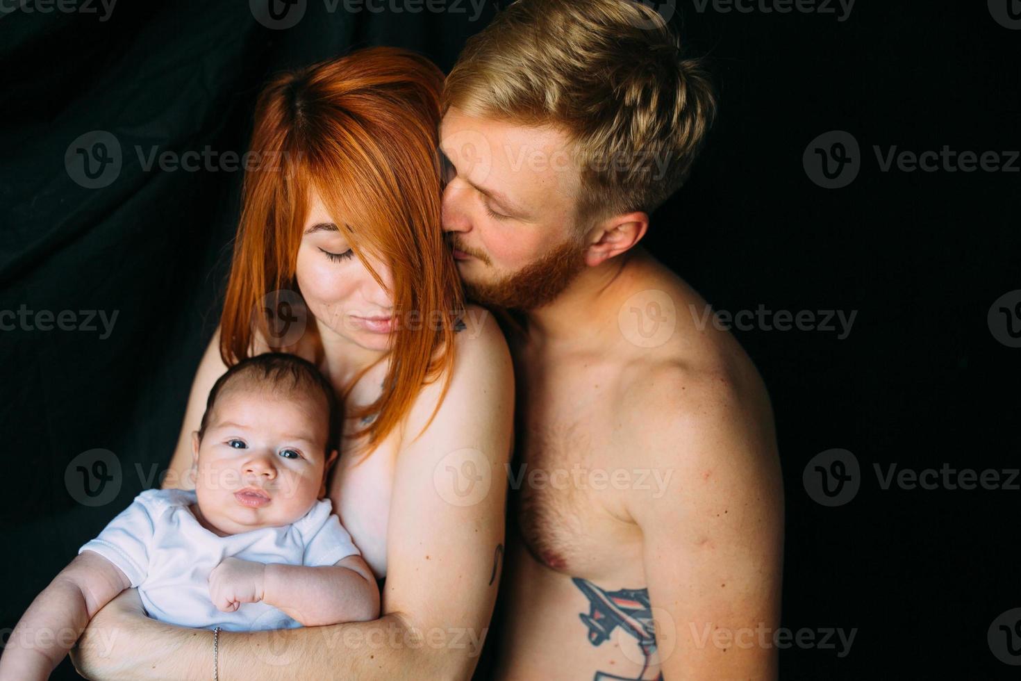 happy family on a black background photo