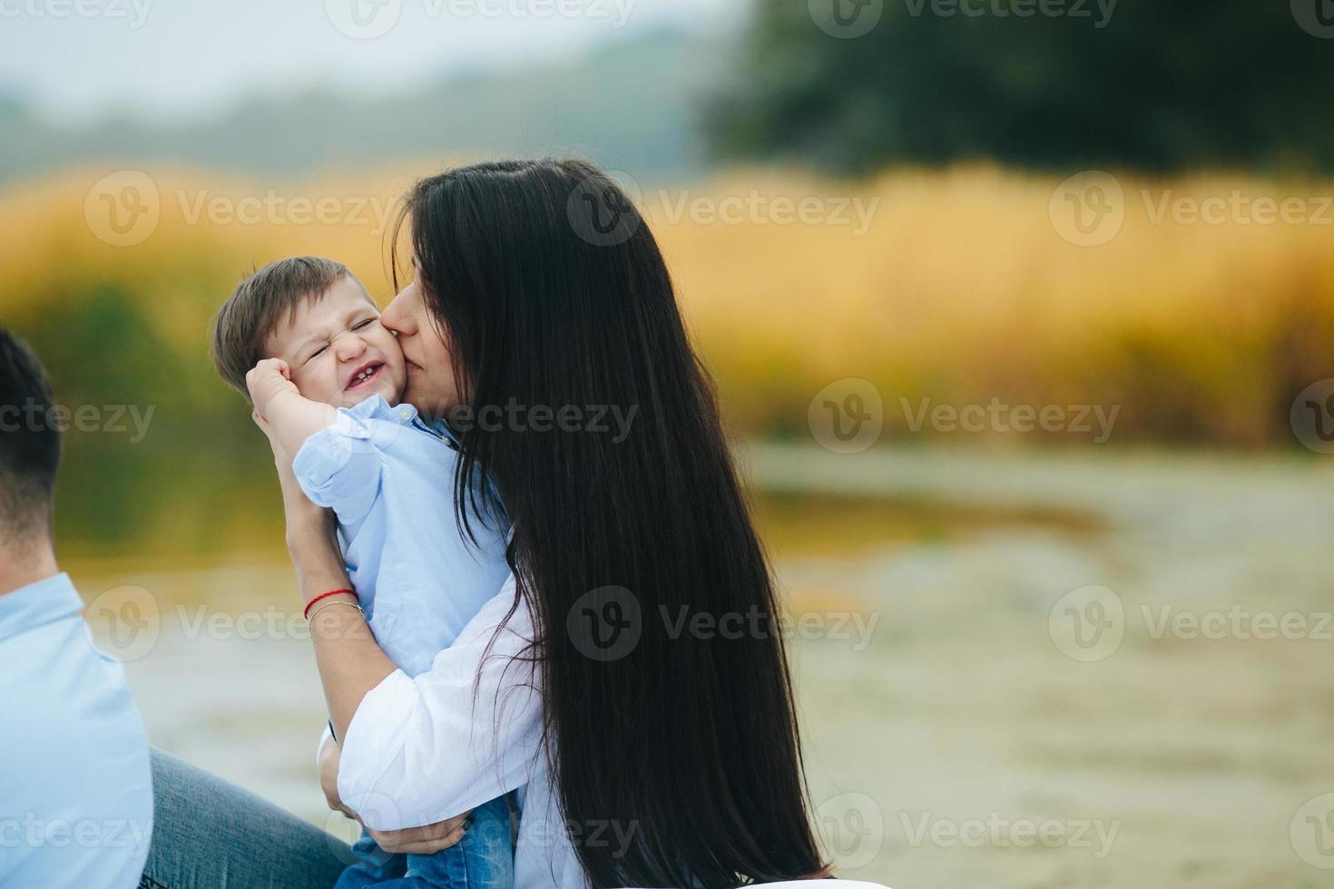 Happy mother with her young son photo