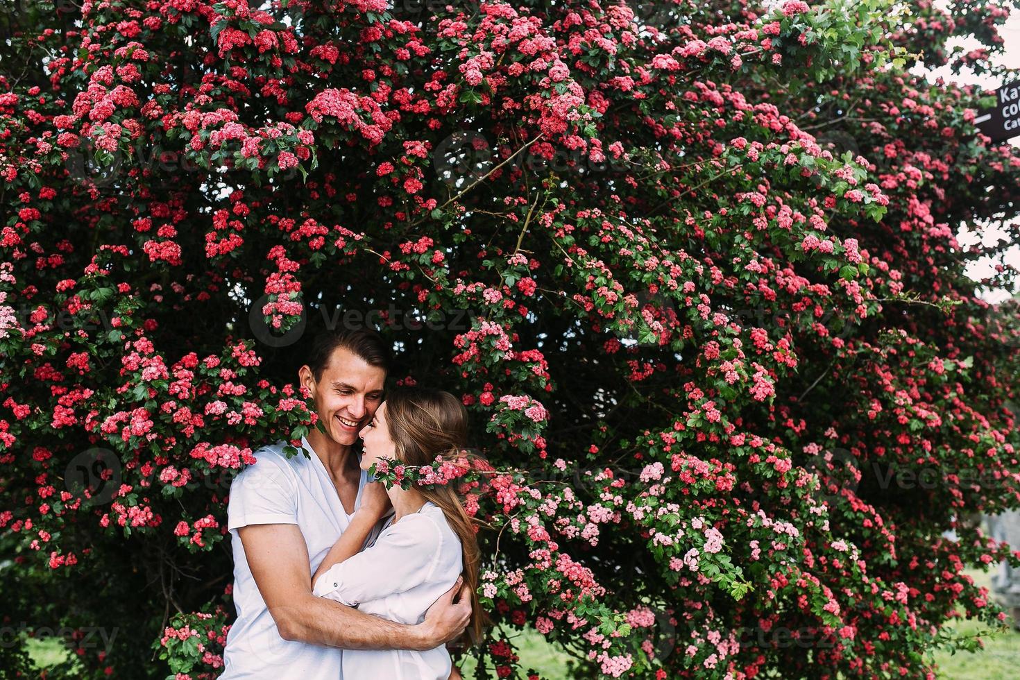 Young happy couple in love outdoors photo