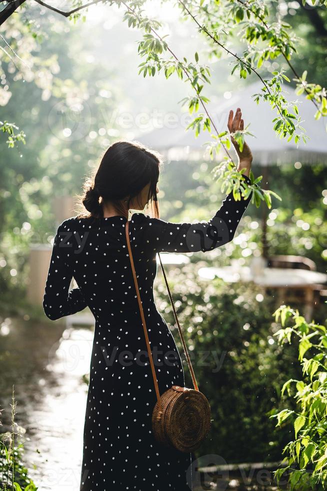 A girl is walking in the park photo