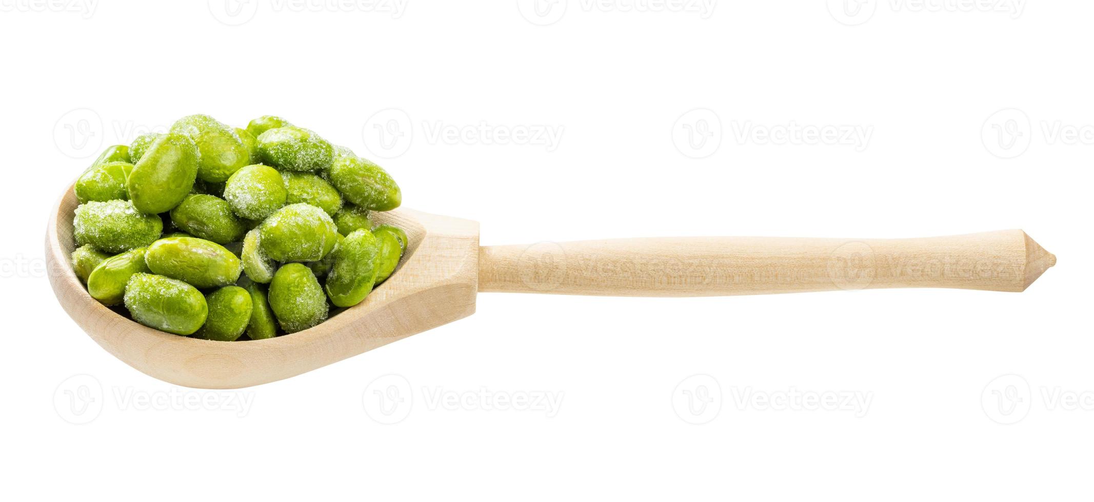 frozen Edamame unripe soybeans in wooden spoon photo