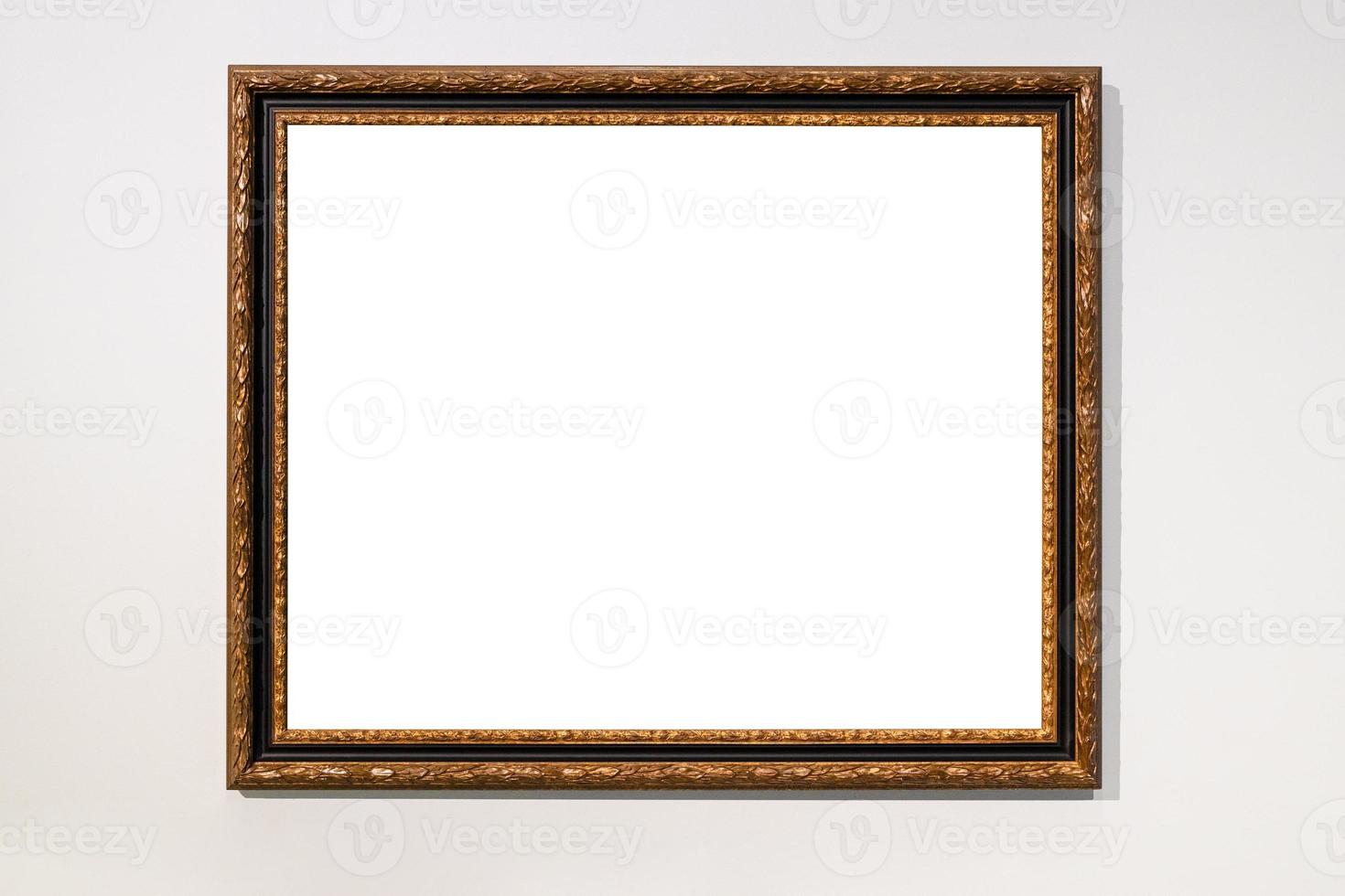 old dark brown picture frame on gray wall photo