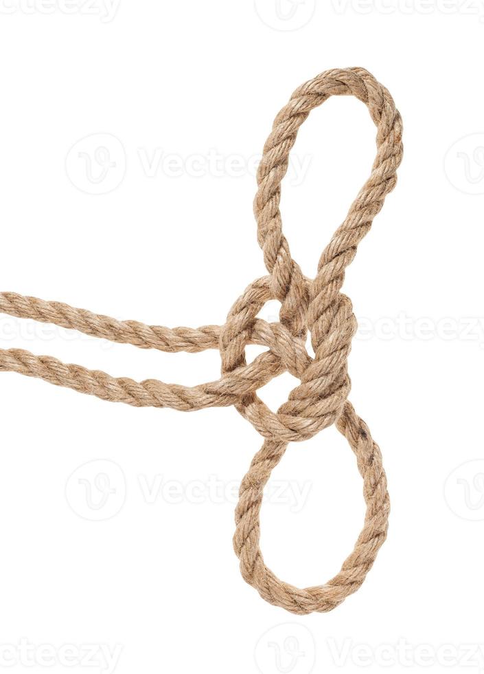 Handcuff knot tied on thick jute rope isolated photo