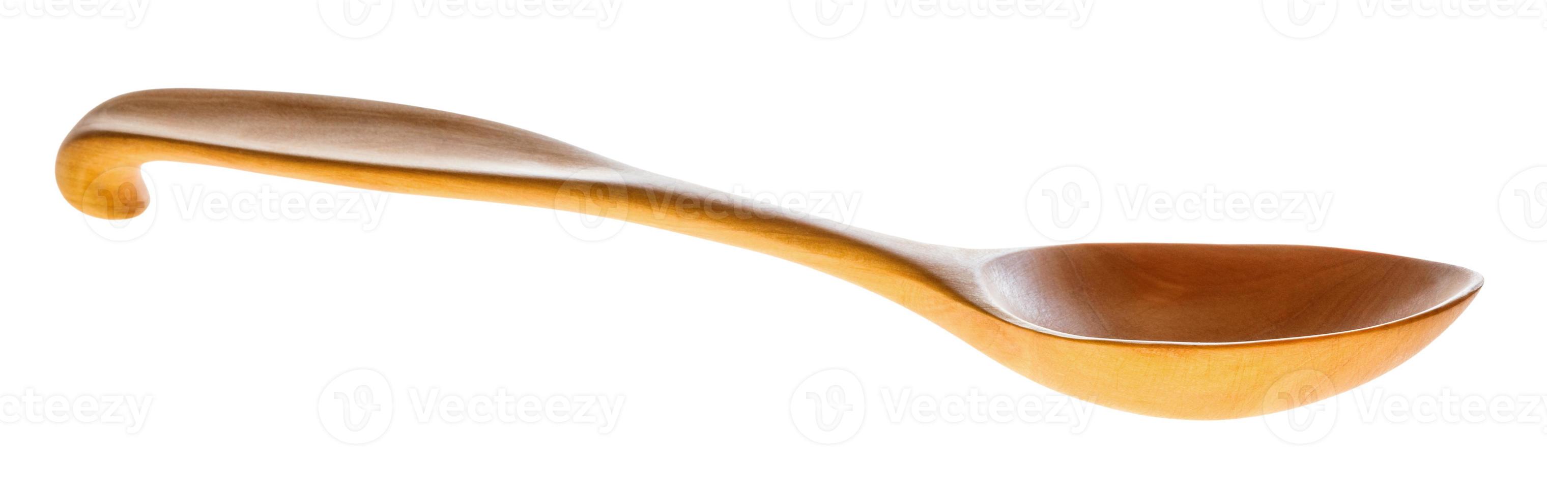 side view of hand carved hawthorn wood soup spoon photo