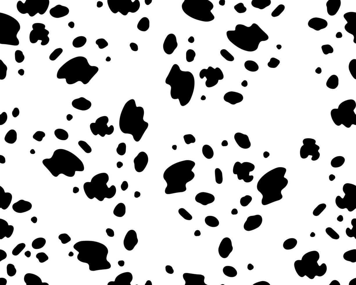 patrón dálmata de patrones sin fisuras sobre un fondo blanco aislado. Estampado animal negro con manchas irregulares. fondo vectorial vector