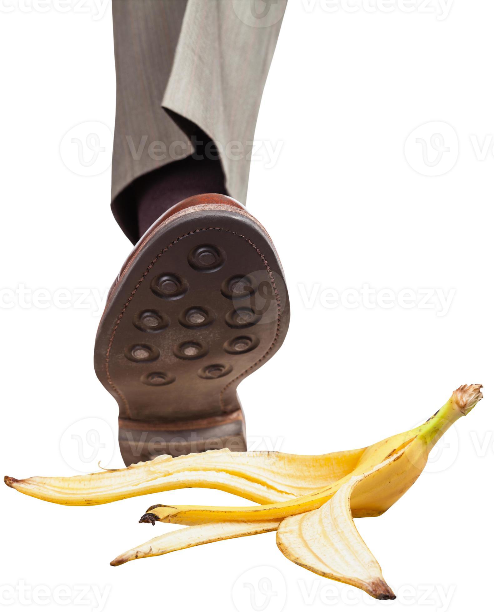 leg in right brown shoe stepping on banana peel 11450215 Stock Photo at