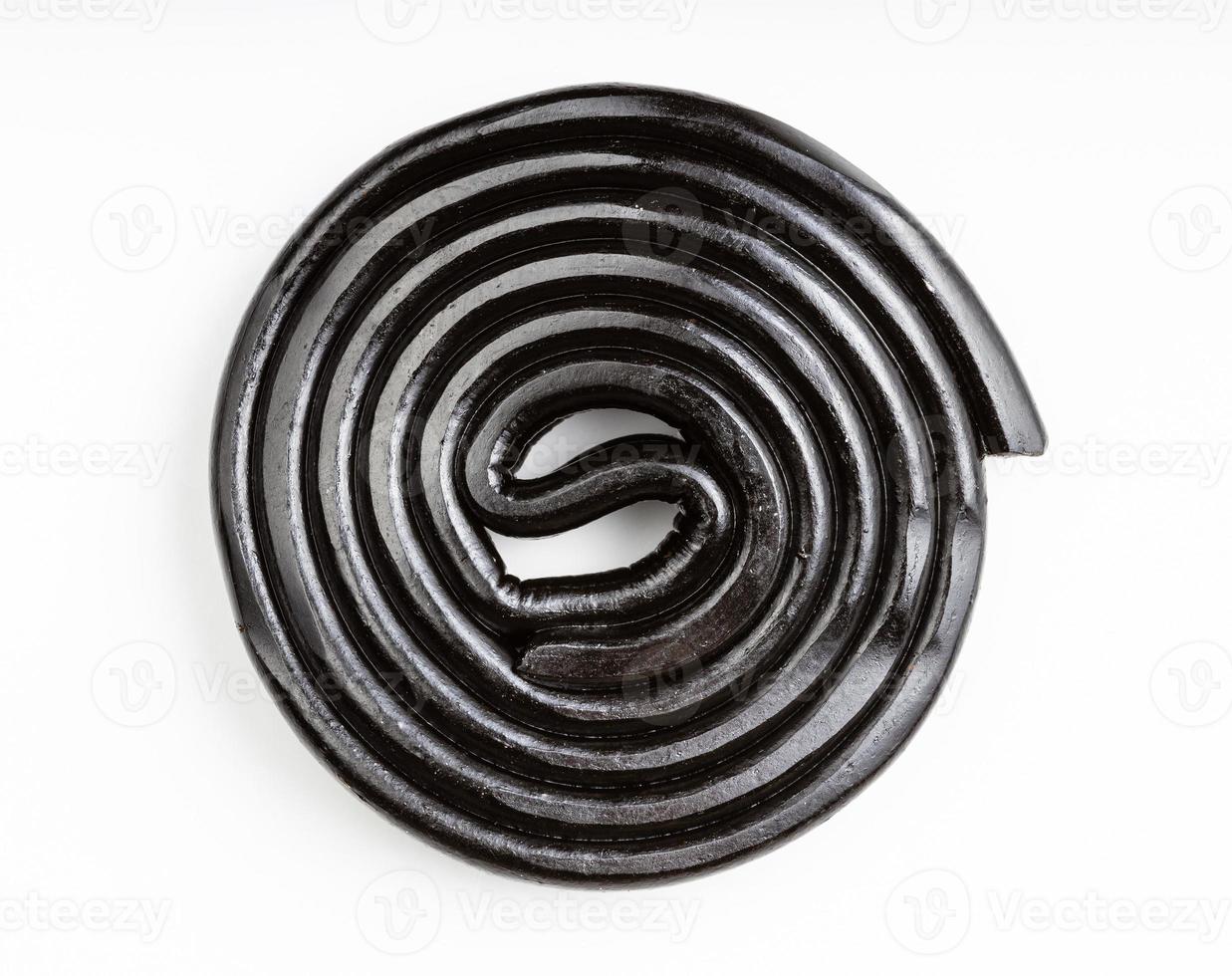 top view of spiral from liquorice candy on white photo