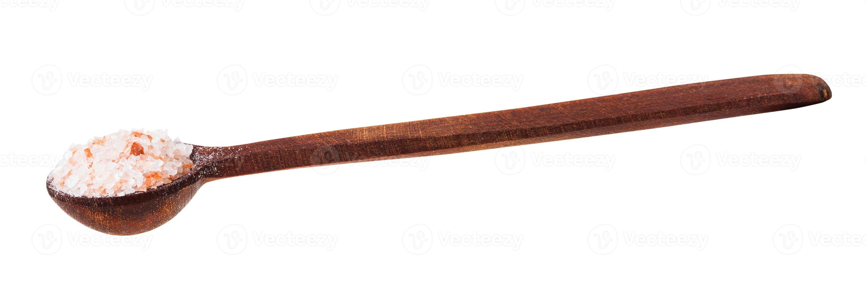 side view of wooden spoon with pink Himalayan Salt photo
