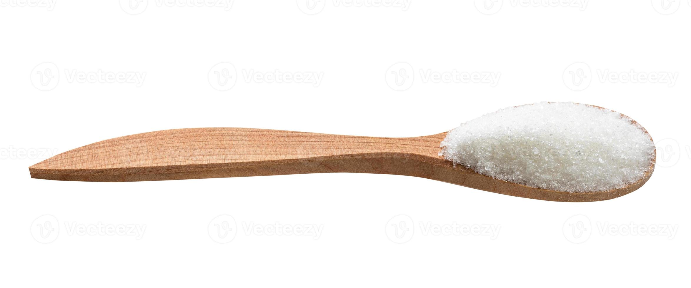 white refined beet sugar in wooden spoon isolated photo