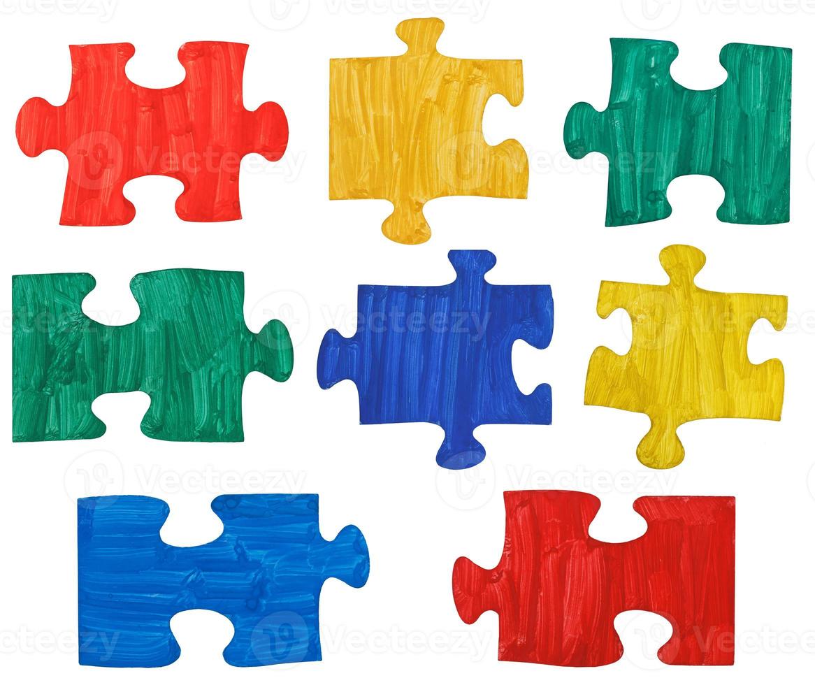 set of colored painted puzzle pieces photo