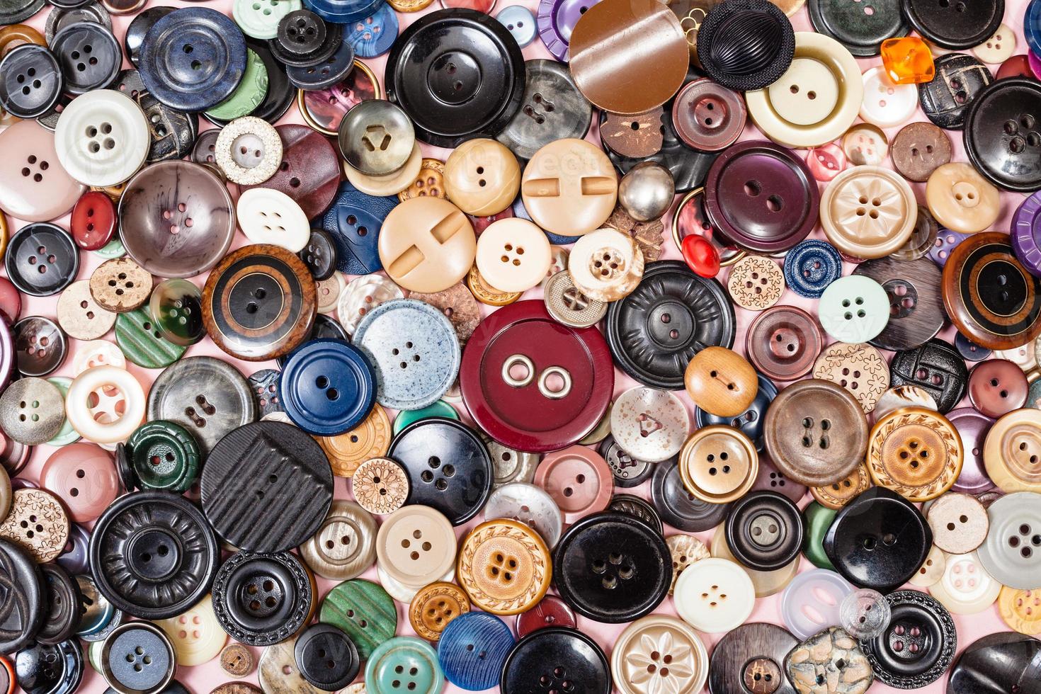 top view of pile of many different buttons photo