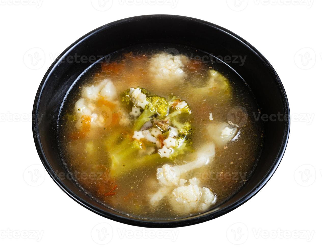 soup with stelline and vegetables in bowl isolated photo