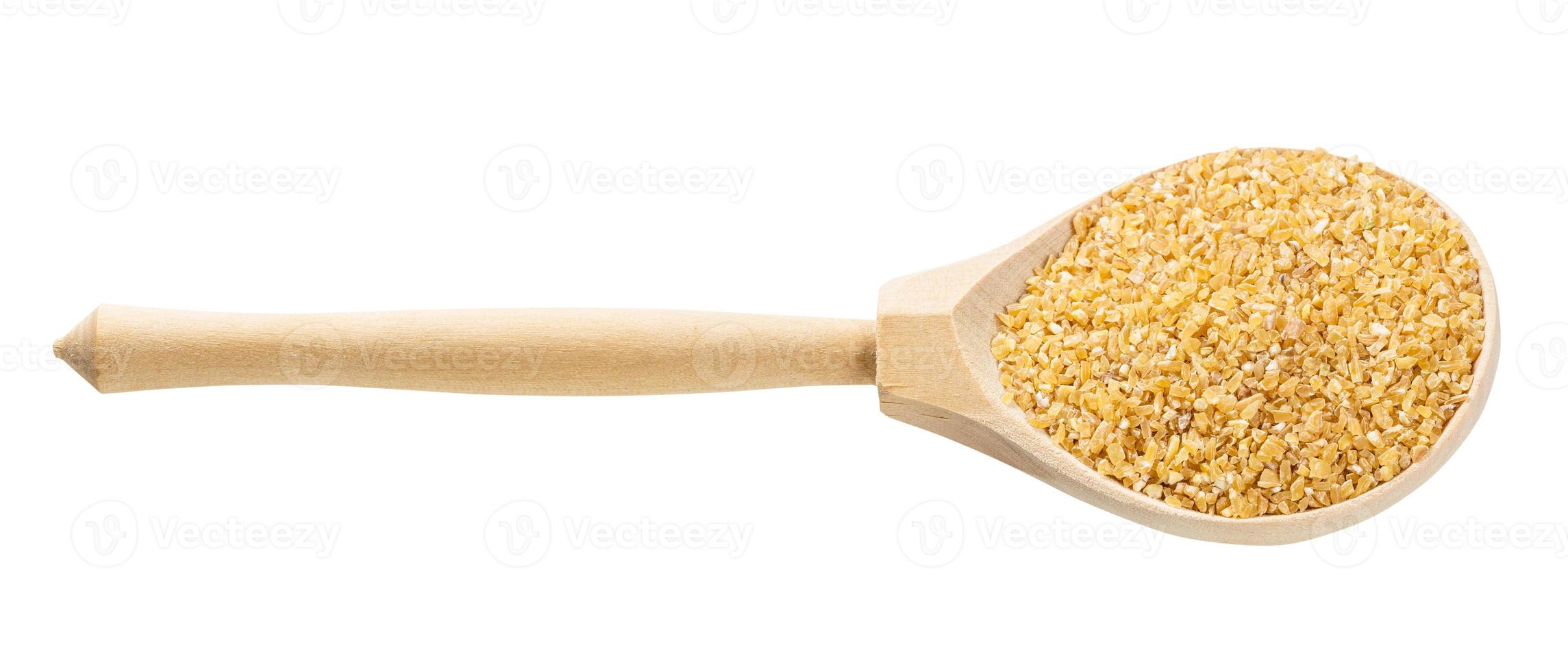 spoon with crushed polished wheat grains isolated photo