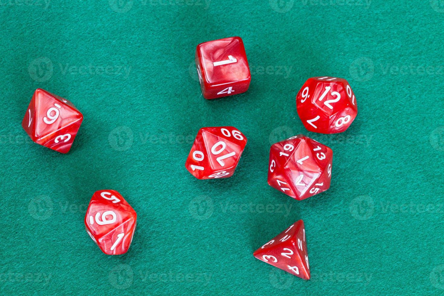 red polyhedral dices for Dungeons and Dragons photo