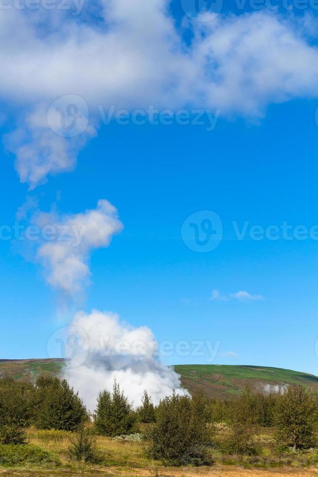 geyser eruption in Haukadalur valley in Iceland photo