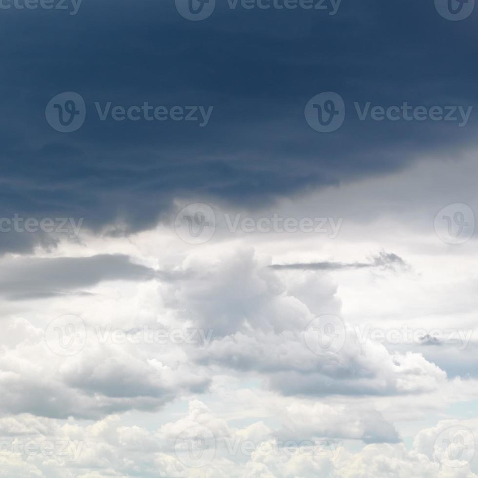 dark grey rainy clouds in overcast sky photo