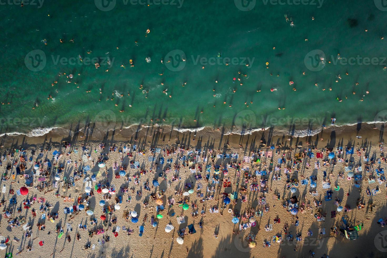 Aerial View of Crowd of People on the Beach photo