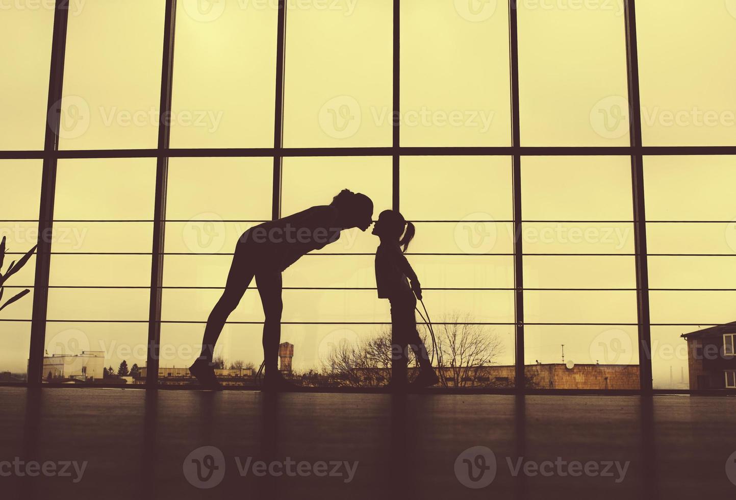 Charming family spends time in the gym photo