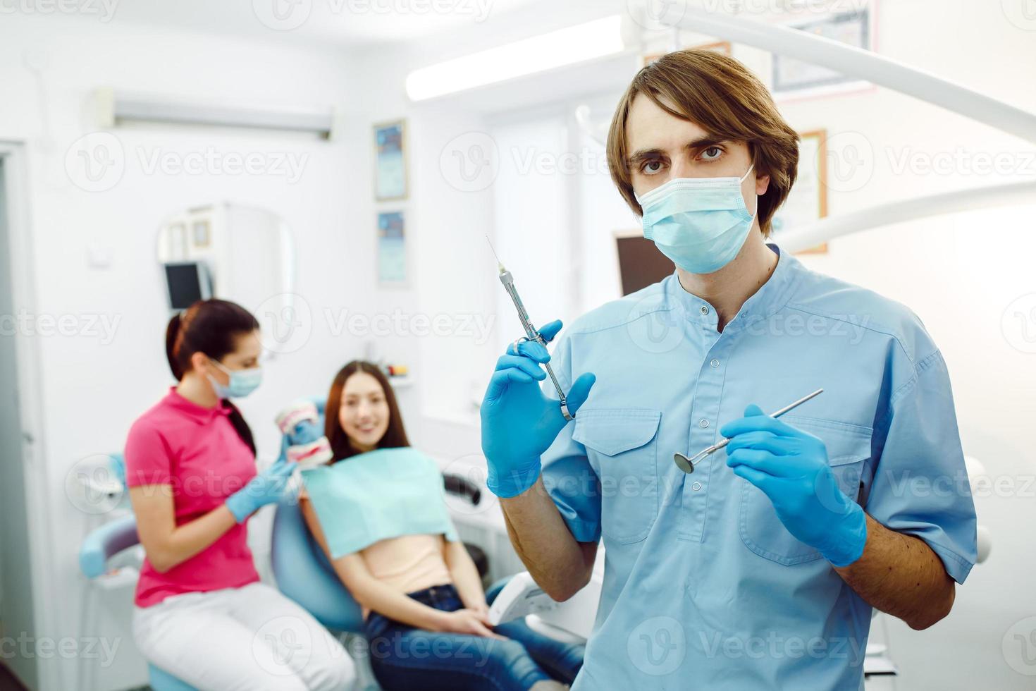 Dental anesthesia on the background of the patient photo