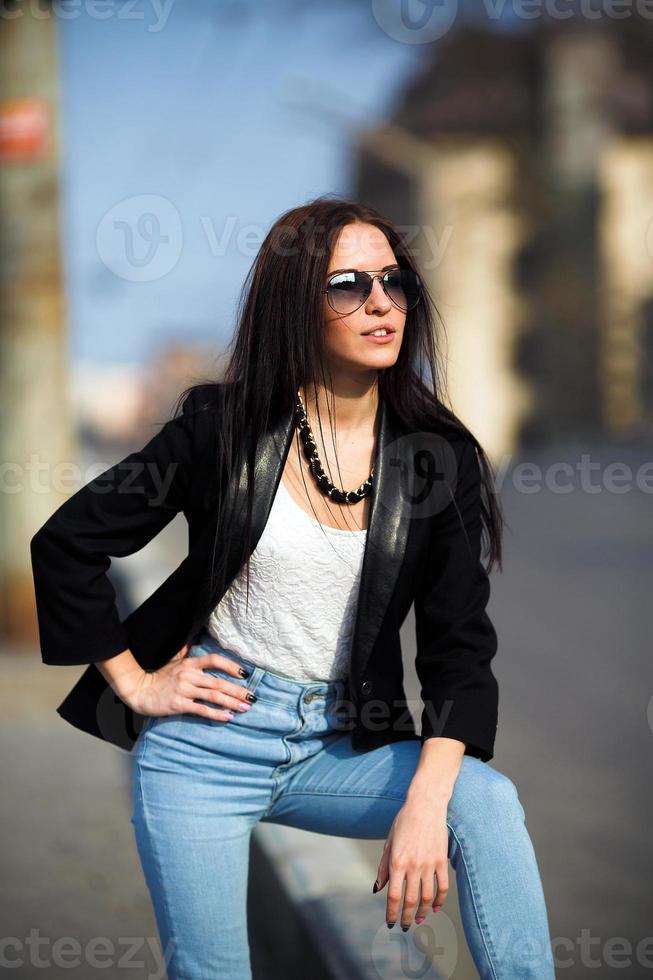 beautiful girl on the background of the road photo