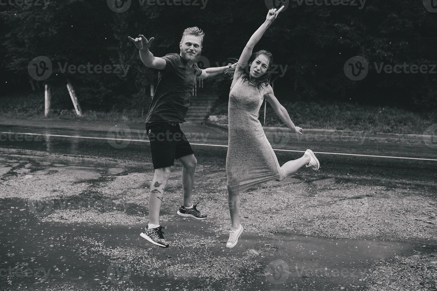 beautiful couple in the rain photo