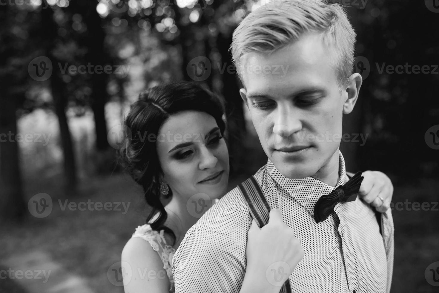 Beautiful wedding couple posing photo