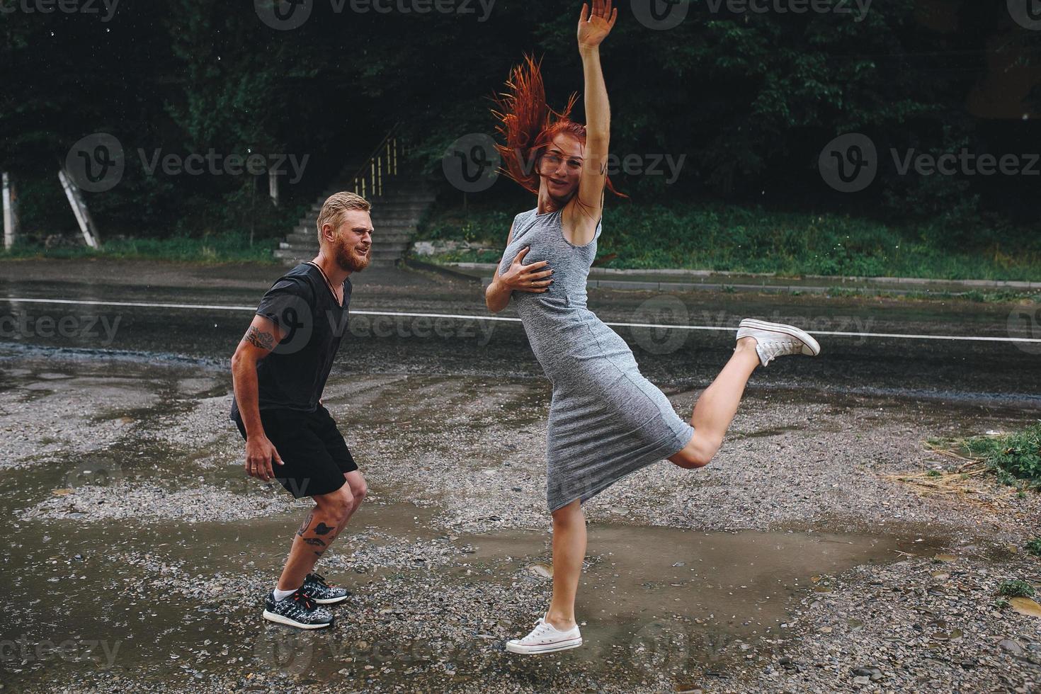 beautiful couple in the rain photo