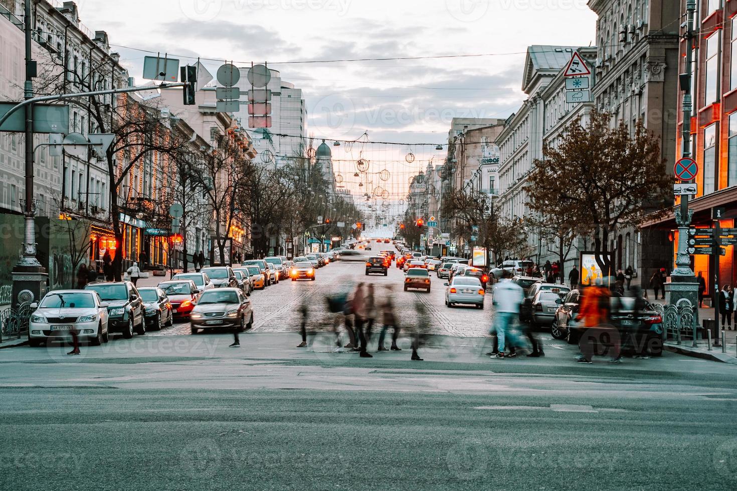 KIEV, UKRAINE - APRIL 14, 2019 Night view of the streets of Kiev. Urban fuss. Bogdan Khmelnitsky Street photo
