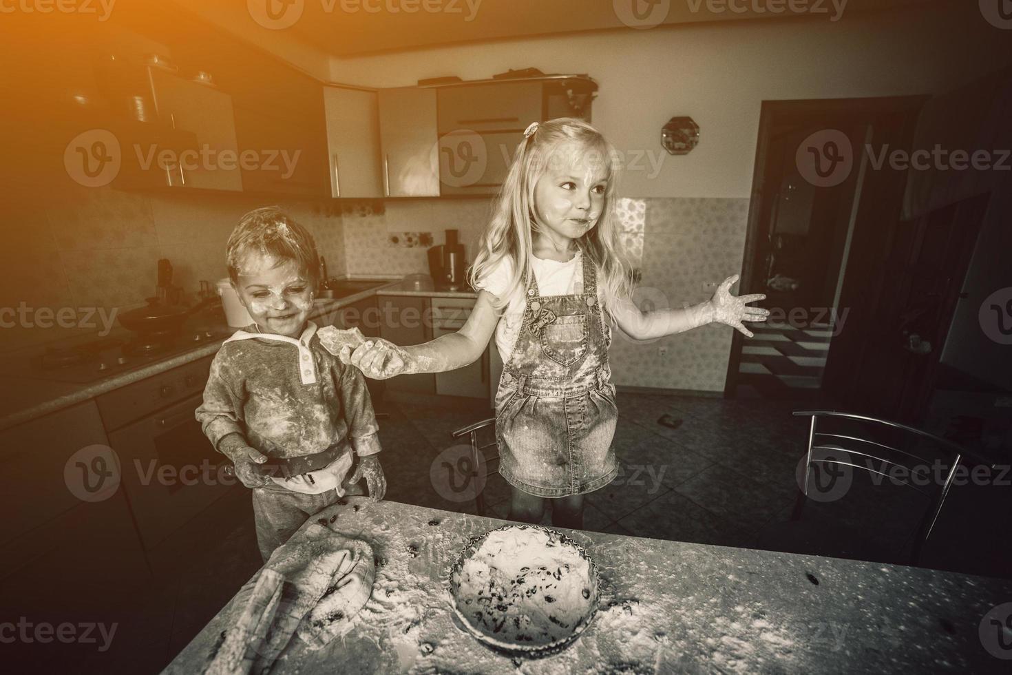 Kids is playing with flour photo