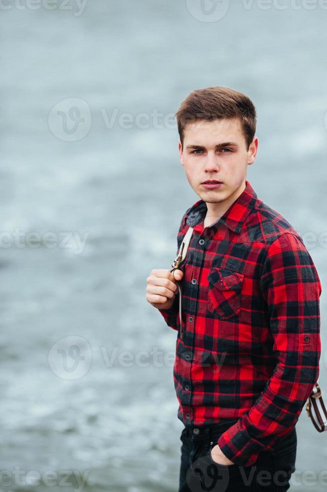 man standing on a pier photo