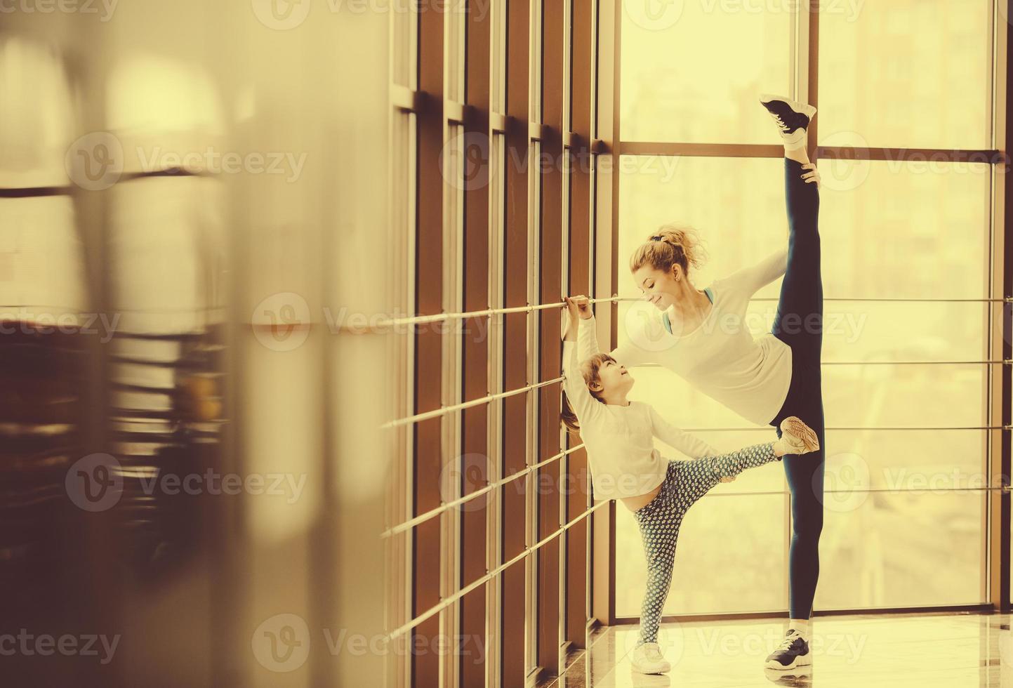 Charming family spends time in the gym photo